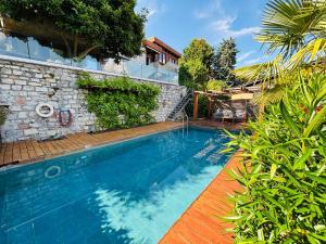 Family suite with garden and amaizing view to Lugano