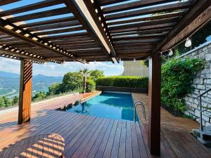 Family suite with garden and amaizing view to Lugano