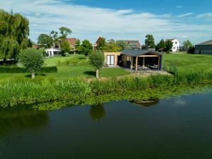Hightree House - Luxe in de polder dichtbij Rotterdam en Zeeland