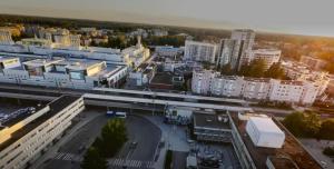 Direct train to Helsinki and airport, near shopping center