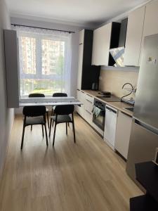 Illumina nowoczesny apartament 50m2, spokojna okolica, 25min do centrum