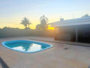 Aconchegante com área gourmet com piscina