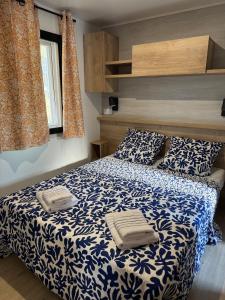 Maisons de vacances Nouveau bungalow No 575 Camping 4 etoiles Lac des Reves : photos des chambres