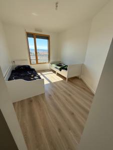 Appartements Appartement grange blanche : photos des chambres