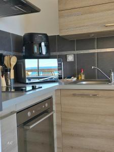 Holiday Dreams - Terrasse avec BBQ et magnifique vue mer, à 5min de la mer et commerce - BY AURAconciergerie