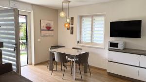 Moderno appartamento con giardino