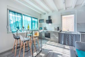 Appartements Golbey Evasion Appartement avec terrasse suspendue : photos des chambres