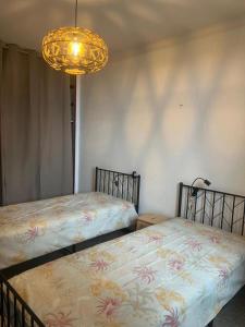 Appartements Eze village bas de villa jardin vue mer : photos des chambres