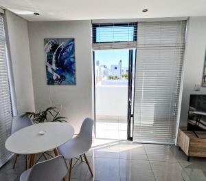 Beachfront Penthouse with patio and free parking