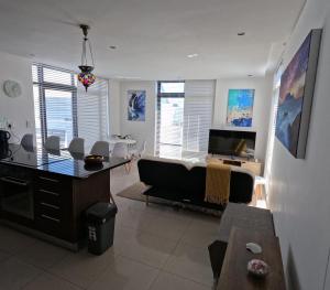 Beachfront Penthouse with patio and free parking