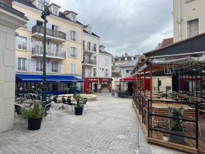 Appartements Townhouse 10 minutes from Paris SLZ : photos des chambres