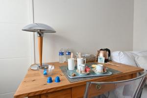 Sejours chez l'habitant Chambre avec sdb privee entre Arenes et Musee de la Romanite : photos des chambres