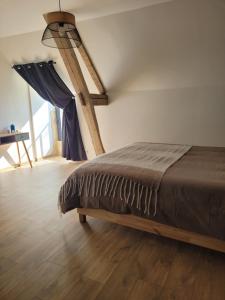 Maisons de vacances Maison dans ancien corps de ferme : photos des chambres