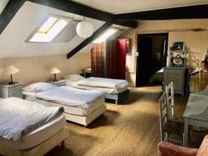 Maisons de vacances Grand Gite a Parce Sur Sarthe : photos des chambres