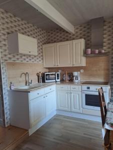 Appartements Appartement le petit voyageur : photos des chambres