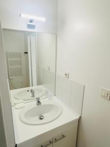 Appartements Lumineux & cosy studio : photos des chambres