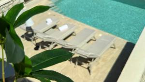 ARYVE Boutique Villa mit Akropolis- und Meerblick, Infinity-Pool und Designer-Interieur