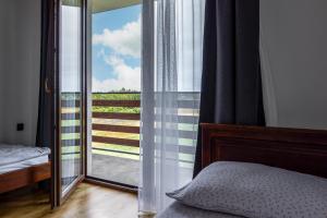 Komfort i spokój blisko natury - Apartamenty i pokoje ARKO