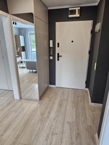 Apartament z widokiem na las