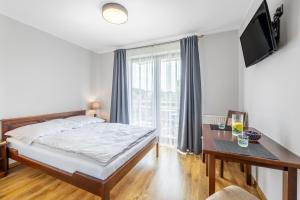 Komfort i spokój blisko natury - Apartamenty i pokoje ARKO