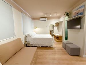 Studio Aconchego portaria 24h, elevador e garagem