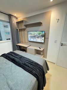 Ap próx ao shopping com garagem, piscina e ar