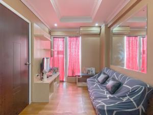 Relaxing 2BR with Pool View Mutiara Bekasi Apartment By Travelio