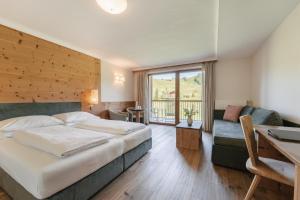 Large Double Room with Balcony and Garden View  room in Brunelle Seiser Alm Lodge