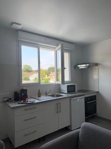Appartements Appartement moderne et spacieux 3 : photos des chambres