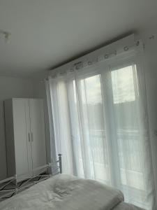 Appartements Appartement moderne et spacieux 3 : photos des chambres
