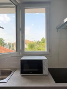 Appartements Appartement moderne et spacieux 3 : photos des chambres