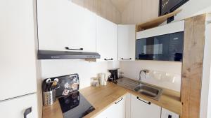 Appartements Pagotin de charme a Metabief : photos des chambres