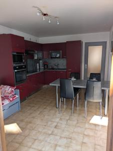 Appartements Appartement du Planet : photos des chambres
