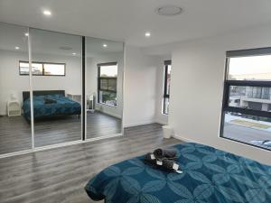 Modern and Spacious Queen Room with Attached Bathroom - NR2