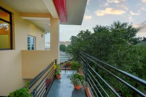 Riva Dreams 2-BHK Retreat with Hill Views & Lush Garden
