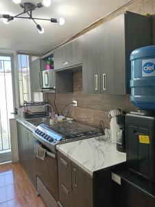 Casa linda y acogedora, a 3 min Distrito Uno