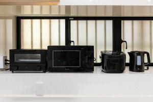 カーサ北谷アメリカンビレッジまで車で5分宮城海岸まで徒歩1分BBQ可能駐車場3台無料i