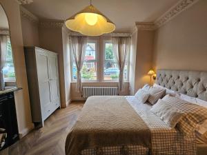 Cosy Garden Flat in Wimbledon