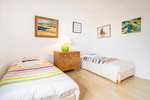 Villas Magnifique villa acces direct plage : photos des chambres