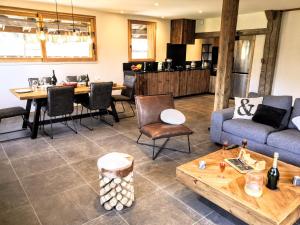 Appartements Chez Lucienne, jacuzzi et sauna : photos des chambres