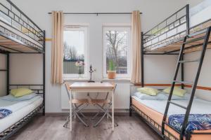 Quadruple Room with Private Bathroom room in Arcus Premium Hostel