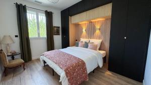 Villas Maison Climatisee 5min Cite Terrasse et Parking AK : photos des chambres