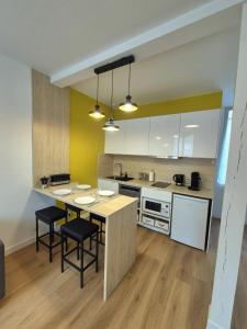 Appartements Cour 36 : photos des chambres