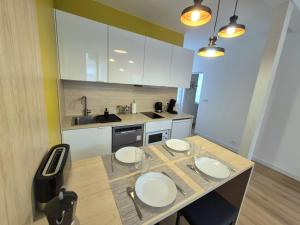 Appartements Cour 36 : photos des chambres