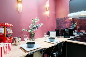 Appartements Le Cinema - Les Demeures d-Adrien : photos des chambres
