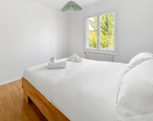 Appartements Maison Cosy Avec Piscine : photos des chambres