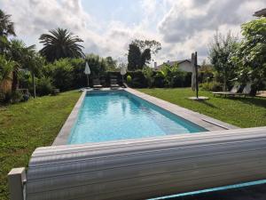 Appartements Appartement avec cuisine et grande piscine chauffee : photos des chambres