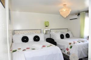Sejours chez l'habitant Villa confort - Hebergement Touristique Grand PARIS : photos des chambres