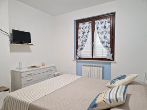 Trilocale a 350 metri dal mare con posto auto e doccia esterna