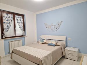 Trilocale a 350 metri dal mare con posto auto e doccia esterna